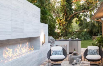 Fire and water feature ideas create a captivating contrast that instantly grabs attention. The flickering flames and the tranquil flow of water add depth, texture, and visual interest to your backyard, making it a feast for the eyes. Find out how we can help!